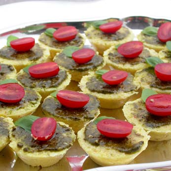 Cheesy Polenta Tartlets with Pesto and Fresh Tomatoes