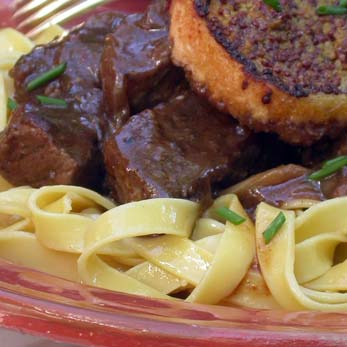 Beef Hot Pot with Mustard Bread Topping
