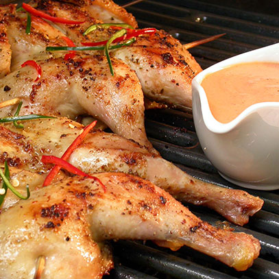 Braaied Baby Chickens with Creamy Prego Sauce